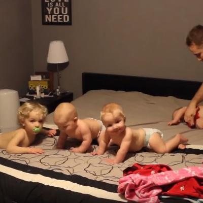 Tata pokušavao da obuče 4 bebe: Ovaj snimak je momentalno postao hit na internetu! (VIDEO)