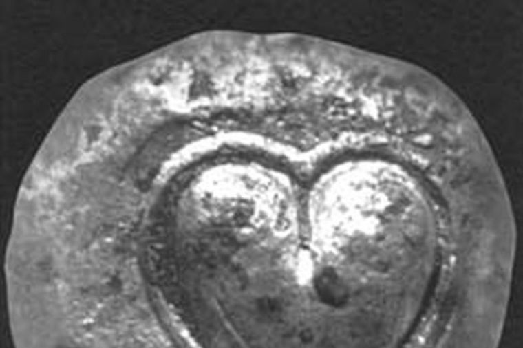 Wikipedia, Simbol srca (seme Silfijuma) na drevnom kirenskom novcu